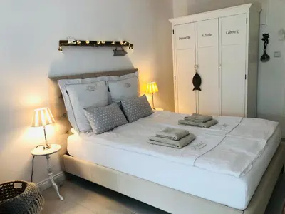 Ein Bett oder Betten in einem Zimmer der Unterkunft Stranddistel Scharbeutz