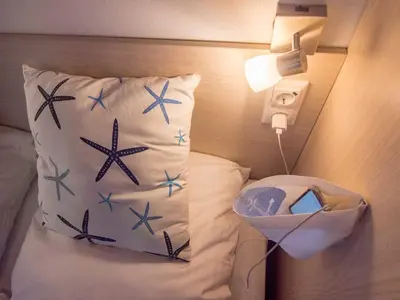 Ein Bett oder Betten in einem Zimmer der Unterkunft Strand 15