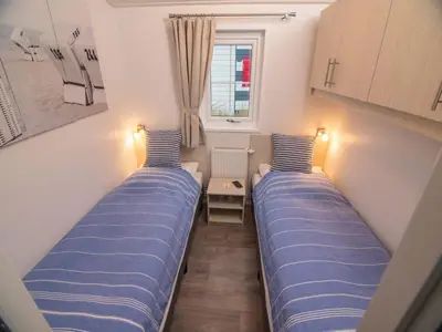 Ein Bett oder Betten in einem Zimmer der Unterkunft Pier98 24