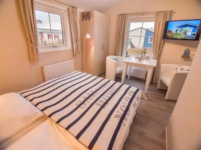 Ein Bett oder Betten in einem Zimmer der Unterkunft Welle 38b