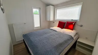 Ein Bett oder Betten in einem Zimmer der Unterkunft Meer 44