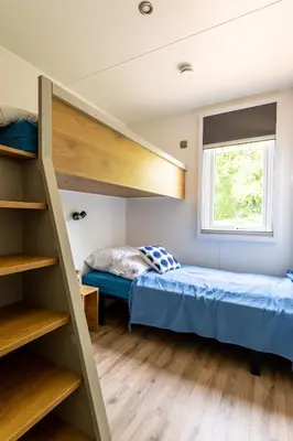 Ein Bett oder Betten in einem Zimmer der Unterkunft Muschel 53
