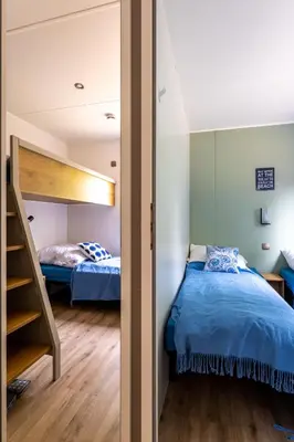 Ein Bett oder Betten in einem Zimmer der Unterkunft Muschel 57
