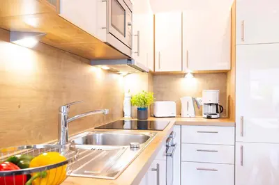 Küche/Küchenzeile in der Unterkunft DKK1c Ferienwohnung Mole 1