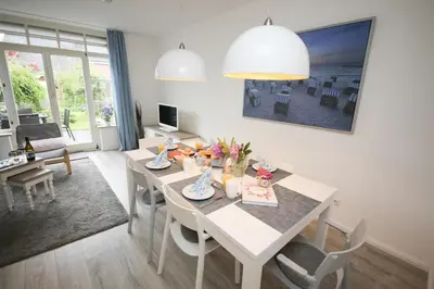 Ein Sitzbereich in der Unterkunft Ferienhaus Haff Huus