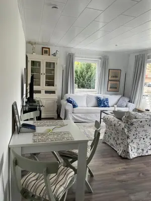 Ein Sitzbereich in der Unterkunft Hamptons No.4
