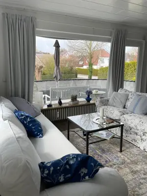 Ein Sitzbereich in der Unterkunft Hamptons No.4
