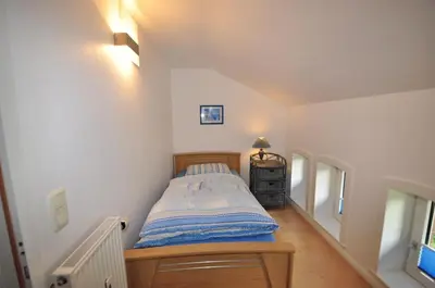 Ein Bett oder Betten in einem Zimmer der Unterkunft Ferienwohnungen Abraham