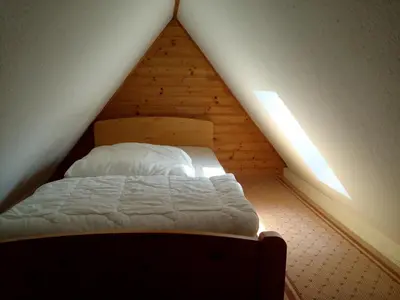 Ein Bett oder Betten in einem Zimmer der Unterkunft Ferienwohnung Haus Lüdtke