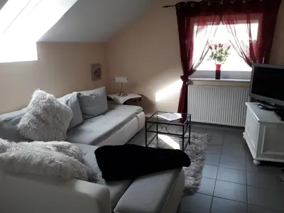 Ein Sitzbereich in der Unterkunft Gästehaus Strandkonsulat