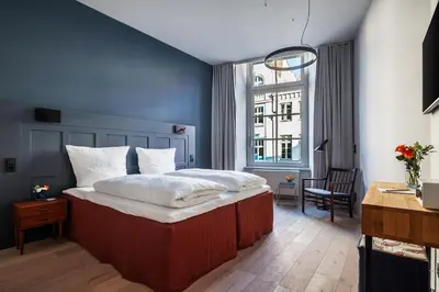 Ein Bett oder Betten in einem Zimmer der Unterkunft Hotel Die Reederin