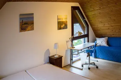 Ein Sitzbereich in der Unterkunft Ferienhaus im Bestetal