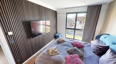 Ein Bett oder Betten in einem Zimmer der Unterkunft Heaven House Penthousewohnung Siebter Himmel