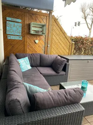 Ein Sitzbereich in der Unterkunft Stylische Ferienwohnung Scharbeutz TOP LAGE Strand