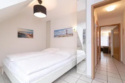 Ein Bett oder Betten in einem Zimmer der Unterkunft Gorch-Fock Park 9