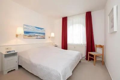 Ein Bett oder Betten in einem Zimmer der Unterkunft Haus Pegasus Gartenliebe
