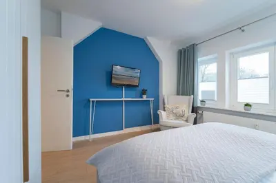 Ein Bett oder Betten in einem Zimmer der Unterkunft Tanneneck Storchennest