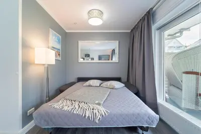 Ein Bett oder Betten in einem Zimmer der Unterkunft Badeweg 4 Haus Bullerbü- App 6