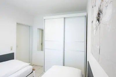 Ein Bett oder Betten in einem Zimmer der Unterkunft Alte Bergstraße 6 Sprottentraum