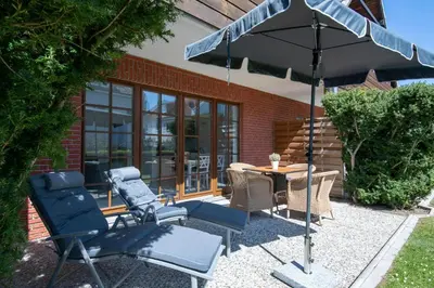 Ein Garten an der Unterkunft Alte Bergstraße 6 Heringsoase