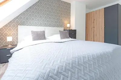 Ein Bett oder Betten in einem Zimmer der Unterkunft Seestraße 43 Wohnung 10