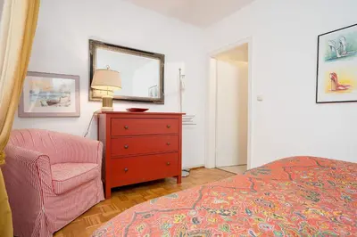 Ein Bett oder Betten in einem Zimmer der Unterkunft Ostseeperle