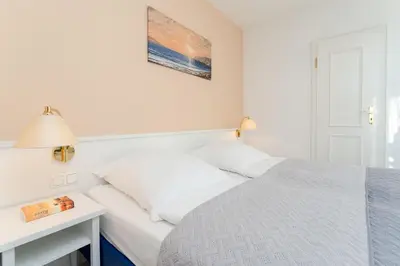 Ein Bett oder Betten in einem Zimmer der Unterkunft Seepferdchen Deern