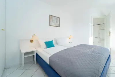 Ein Bett oder Betten in einem Zimmer der Unterkunft Seepferdchen Wellenstuv
