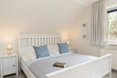Ein Bett oder Betten in einem Zimmer der Unterkunft Seepark Lindenallee Krabbe