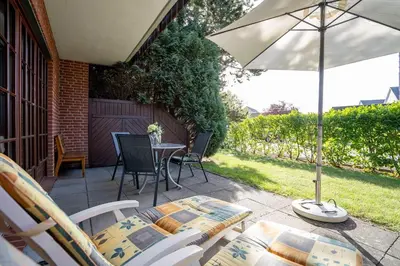 Ein Garten an der Unterkunft Schmiedestraße 3 Küstencharme