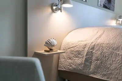 Ein Bett oder Betten in einem Zimmer der Unterkunft Seepark Strandglück