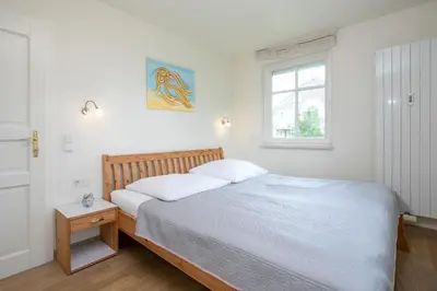 Ein Bett oder Betten in einem Zimmer der Unterkunft Haus am Kurpark Timmendorfer Strand Wohnung 6