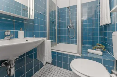Ein Badezimmer in der Unterkunft Haus Bellevue Möwensuite