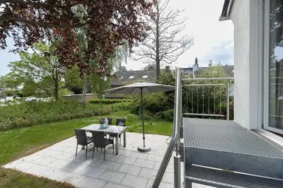 Ein Garten an der Unterkunft Gorch-Fock-Ring 19 Meerzeit II