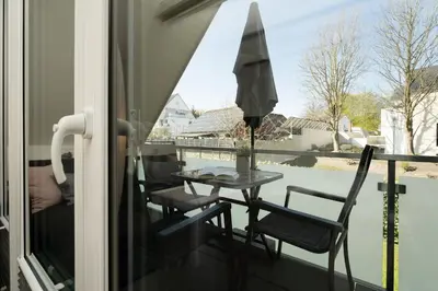 Ein Balkon oder eine Terrasse in der Unterkunft Badeweg 4 Bullerbü 10