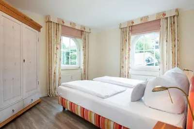 Ein Bett oder Betten in einem Zimmer der Unterkunft Haus Pegasus App 1
