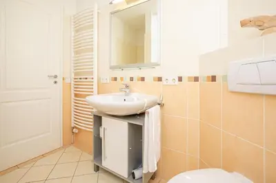 Ein Badezimmer in der Unterkunft Wohnung 4- Paulsen
