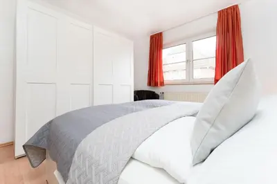 Ein Bett oder Betten in einem Zimmer der Unterkunft Seestraße 56 Wohnung 8