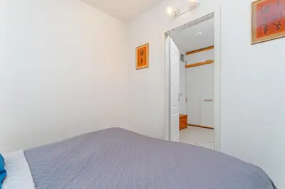 Ein Bett oder Betten in einem Zimmer der Unterkunft Appartementhaus Terrassenhügel Strandhüpfer