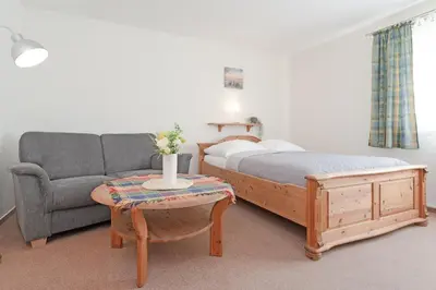 Ein Bett oder Betten in einem Zimmer der Unterkunft Fahrenkrug Westbrise