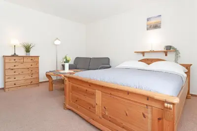 Ein Bett oder Betten in einem Zimmer der Unterkunft Fahrenkrug Westbrise