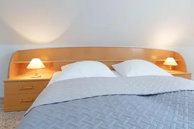 Ein Bett oder Betten in einem Zimmer der Unterkunft Fahrenkrug Südwind