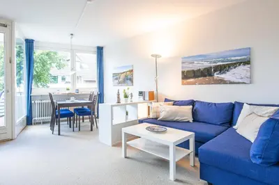 Ein Sitzbereich in der Unterkunft Haus Beau Rivage Blaue Koje