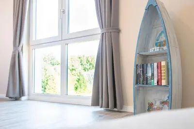 Ein Bett oder Betten in einem Zimmer der Unterkunft Strandnah