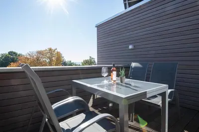Ein Balkon oder eine Terrasse in der Unterkunft Strandnah