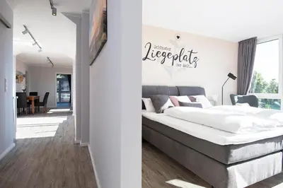 Ein Bett oder Betten in einem Zimmer der Unterkunft Strandnah