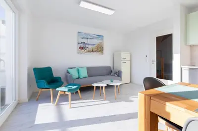 Ein Sitzbereich in der Unterkunft Ferienwohnung Quartier 26