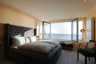 Ein Bett oder Betten in einem Zimmer der Unterkunft Ferienwohnung Aalkate App 3