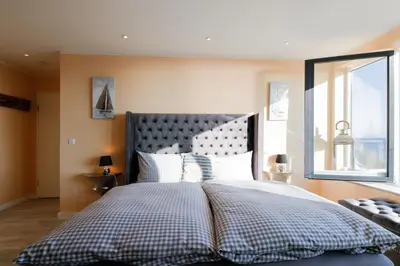 Ein Bett oder Betten in einem Zimmer der Unterkunft Ferienwohnung Aalkate App 3
