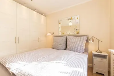Ein Bett oder Betten in einem Zimmer der Unterkunft Ferienwohnung Meeresleuchten